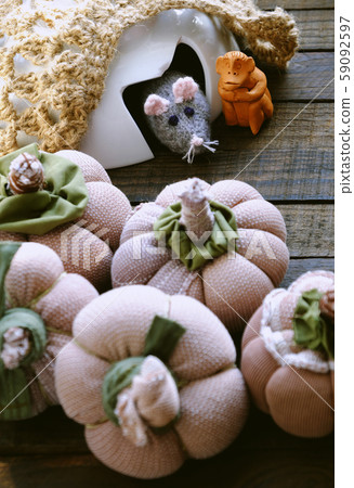 Funny concept for rat year, mouse animal in mice cave, pumpkin autumn background Funny concept for rat year, mouse animal in mice cave, pumpkin autumn background 59092597