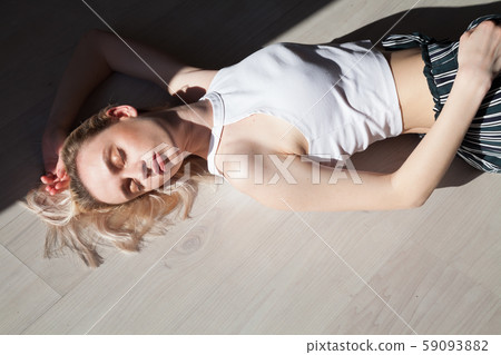 Porter beautiful fashionable blonde woman in clothes 59093882