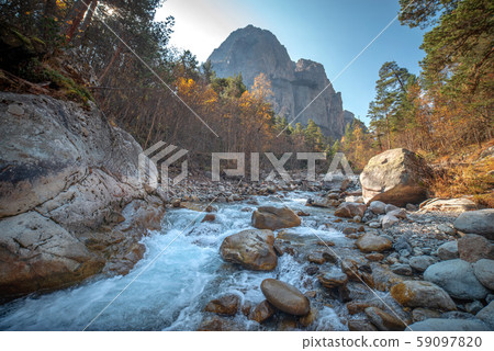 Mountain river in the mountains of the Caucasus. Mountain river in the mountains of the Caucasus. 59097820
