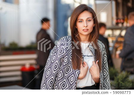 Fashion beautiful girl in a fashionable jacket 59098773