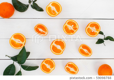 Natural fresh orange with leaves lies  59098788