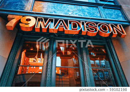 Street sign (nameplate) of Madison Avenue 79. New 59102198