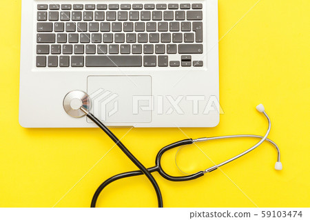 Stethoscope keyboard laptop computer isolated on 59103474