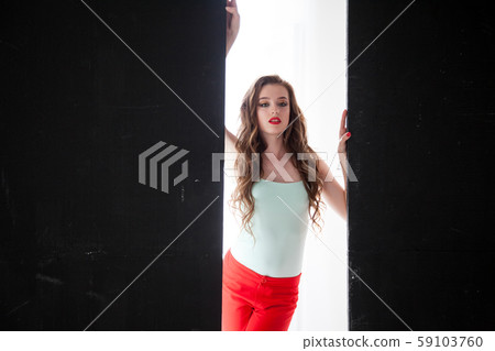 Portrait of a fashionable beautiful girl with long hair Portrait of a fashionable beautiful girl with long hair 59103760