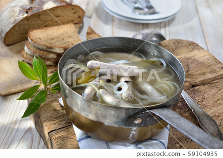 Bavarian food with cooked Nuremberg sausages Bavarian food with cooked Nuremberg sausages 59104935