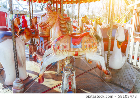 Vintage Merry-Go-Round flying horse carousel in Vintage Merry-Go-Round flying horse carousel in 59105478