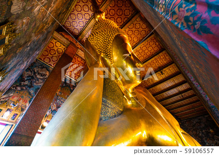 Reclining golden buddha inside of pagoda Wat Pho Reclining golden buddha inside of pagoda Wat Pho 59106557