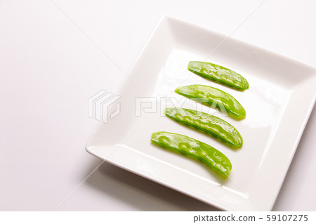 Silk sheath. Boiled and arranged in a white plate. 59107275