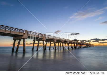 Juno Beach Pier just before sunrise Juno Beach Pier just before sunrise 59108191