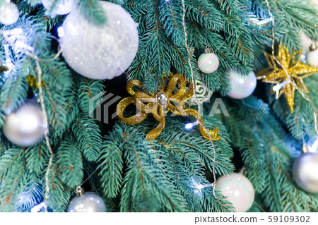Christmas tree and Christmas decorations close up Christmas tree and Christmas decorations close up 59109302