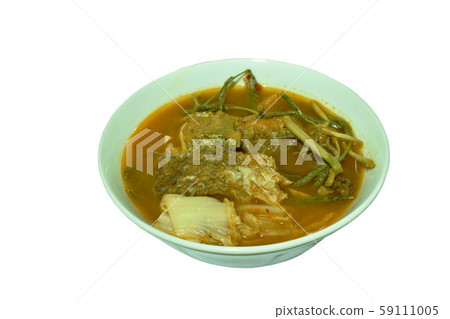 fried fish and egg stuffed climbing wattle in spicy sour soup on bowl 59111005