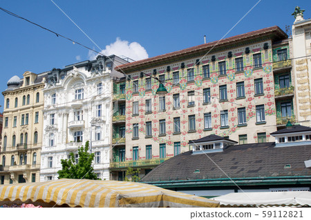 VIENNA, AUSTRIA - APR 30th, 2017: The Majolica House Majolikahaus with its floral ornamentation near VIENNA, AUSTRIA - APR 30th, 2017: The Majolica House Majolikahaus with its floral ornamentation near 59112821
