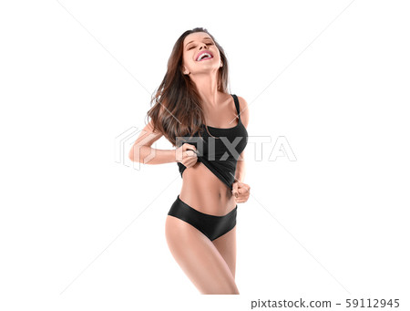 Happy laughing young woman showing her waist. 59112945