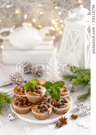 Blueberry muffins and Christmas decorations 59114796
