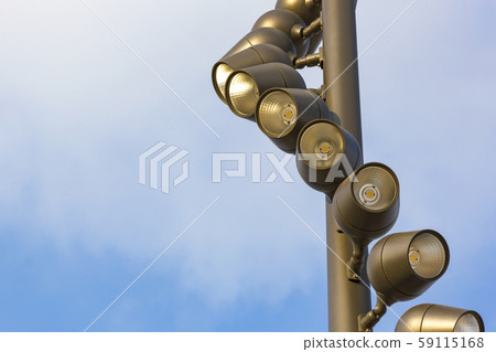 Street lights shot close up against the sky. Street lights shot close up against the sky. 59115168