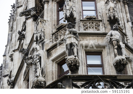 Munich.  Elements of architecture and statues of the new city hall on Marienplatz in the center of  59115191