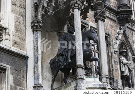 Munich. Elements of architecture and statues of the new city hall on Marienplatz in the center of Munich. Elements of architecture and statues of the new city hall on Marienplatz in the center of 59115199