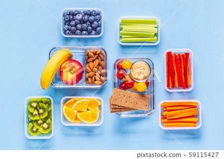 Healthy snack on a pastel background. 59115427