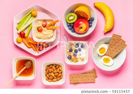 Healthy snack on a pastel background. 59115437
