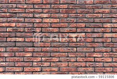 A wall of red, old brick. Background, texture and concept. A wall of red, old brick. Background, texture and concept. 59115806