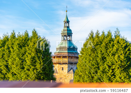 Detailed view of tower of St George Church in Horni Slavkov. Sunny autumn day. Czech Republic Detailed view of tower of St George Church in Horni Slavkov. Sunny autumn day. Czech Republic 59116487