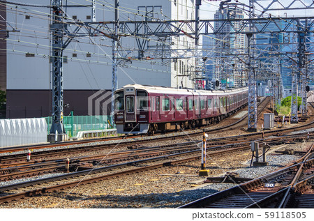 Hankyu train leaving Osaka Juso Station, Series 9300 59118505