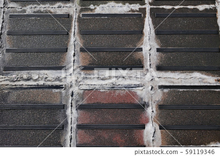 Eflorescence that exudes from the joints of the concrete floor board of the pedestrian bridge slope Eflorescence that exudes from the joints of the concrete floor board of the pedestrian bridge slope 59119346