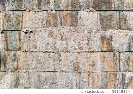 Eflorescence that exudes from the joints of the concrete block of the retaining wall 59119354