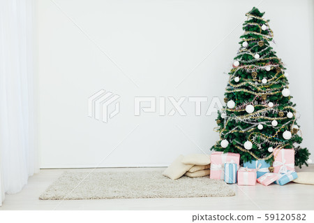 Christmas tree with gifts for the new year in the interior 59120582