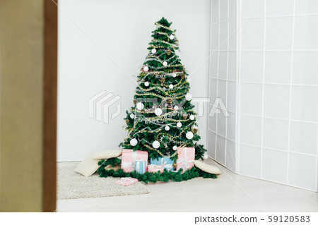 Christmas tree with gifts for the new year in the interior Christmas tree with gifts for the new year in the interior 59120583