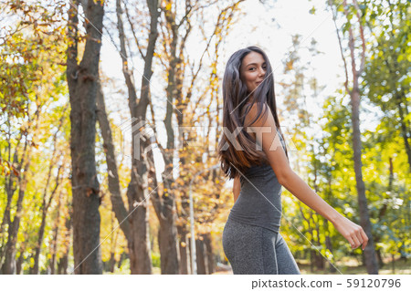 Pretty lady having fun during her morning run 59120796