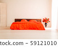 the Interior of the white room with a bed with red 59121010