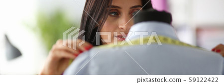 Female hands in the workshop hold Female hands in the workshop hold 59122422