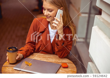 Female freelancer taking a break from work Female freelancer taking a break from work 59124642
