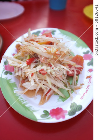 Papaya Salad (Som tum Thai) on Red table Papaya Salad (Som tum Thai) on Red table 59126041