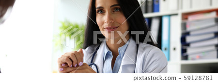 Female visitor filling out medicine documents 59128781