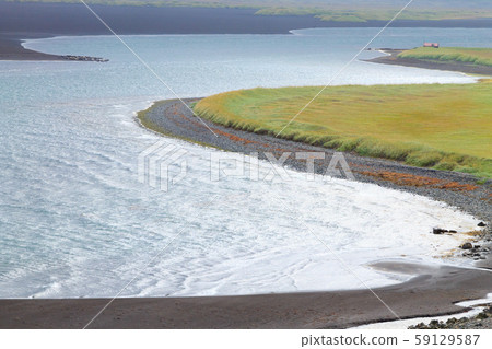 Hvitserkur sea stack, Iceland. Black sand beach Hvitserkur sea stack, Iceland. Black sand beach 59129587