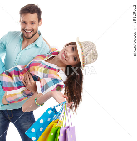 Couple with shopping bags Couple with shopping bags 59129912