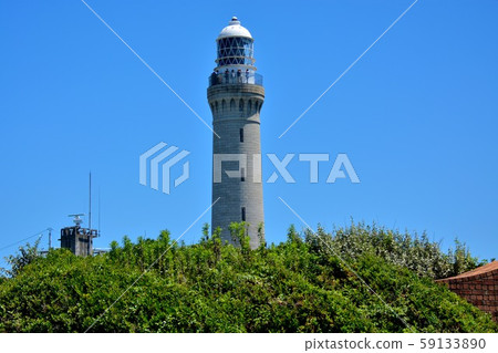Tsunoshima Lighthouse (2) where the beautiful outer wall of Yamaguchi, Tsunoshima and rare granite shines in the blue sky 59133890