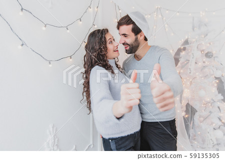 Photo of positive, excited people chilling in nightlife new year party. 59135305