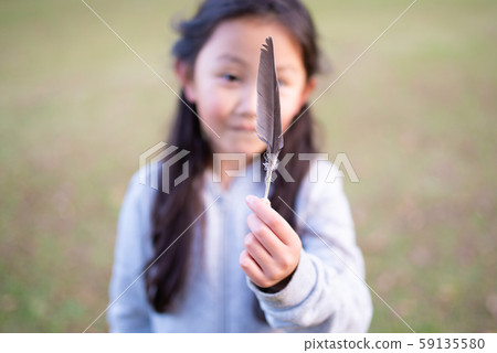 Girl with feathers 59135580