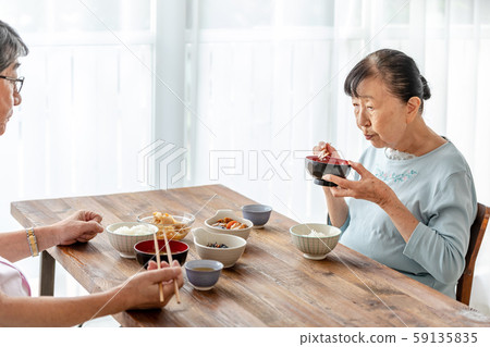 Elderly couple dining table miso soup 59135835