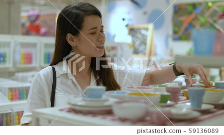 Shopping concepts. The girl is buying the Shopping concepts. The girl is buying the 59136089