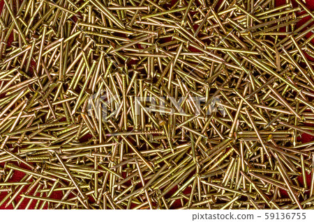 Texture of yellow nails on red background. Texture of yellow nails on red background. 59136755