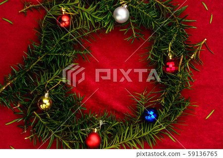 Christmas tree branches stacked in a circle for Christmas tree branches stacked in a circle for 59136765