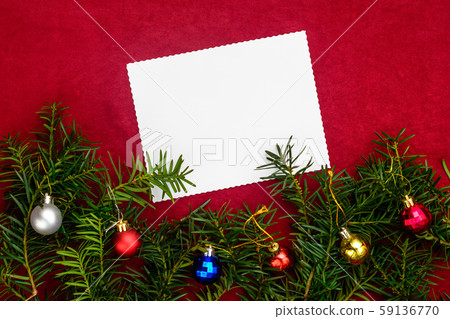 Piece of paper for Christmas wishes on a red Piece of paper for Christmas wishes on a red 59136770