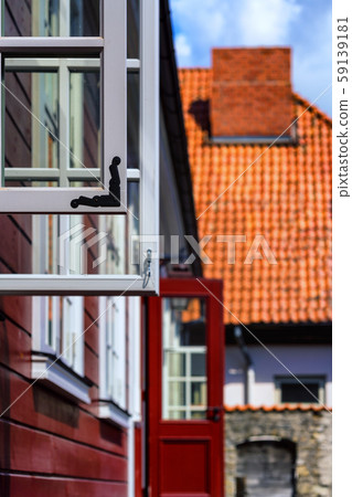 Open windows and doors of an old house Open windows and doors of an old house 59139181