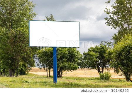 Big blank billboard mock-up along highway against meadow with trees Big blank billboard mock-up along highway against meadow with trees 59140265
