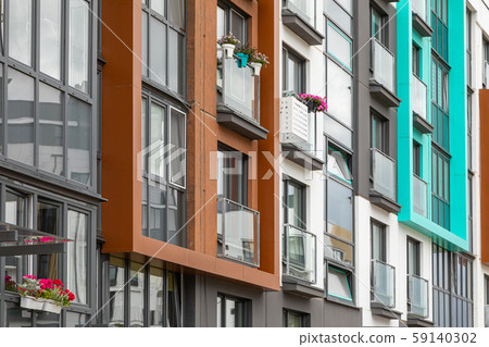 Close-up of house building's balconies and windows Close-up of house building's balconies and windows 59140302