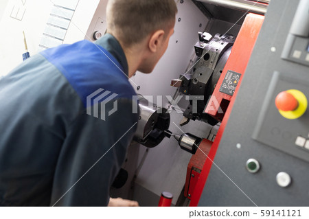 the operator of the machine performs debugging and tuning of the machine with program control 59141121